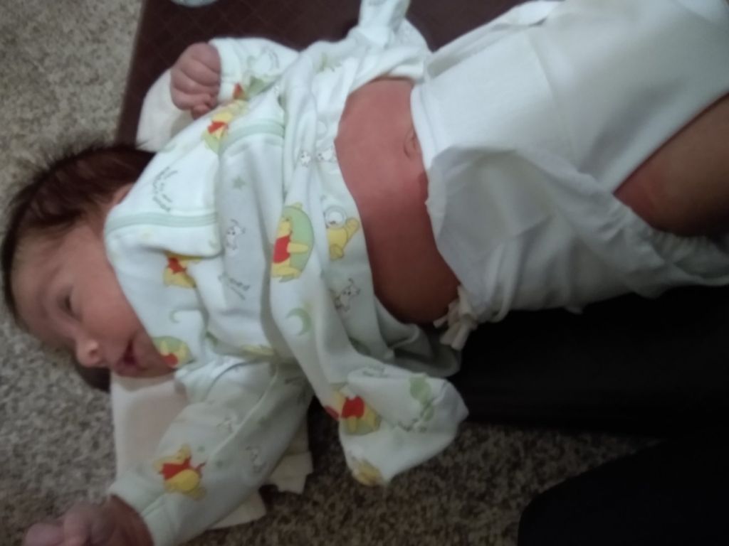 Baby with flat diaper and cover